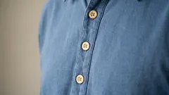 Waarom knopen aan verschillende kanten zitten bij heren- en damesoverhemden